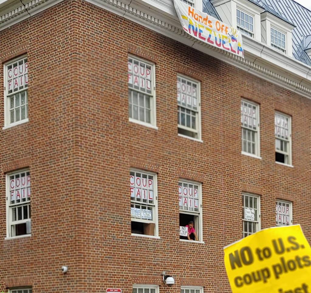 Photo of the Venezuelan Embassy-- in every window, there is a large sign that reads "Coup Fail". 